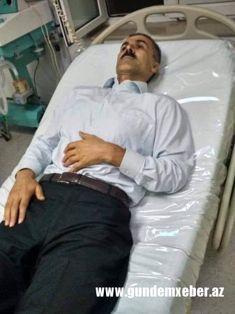 Oqtay Gülalıyev danışmağa cəhd edir